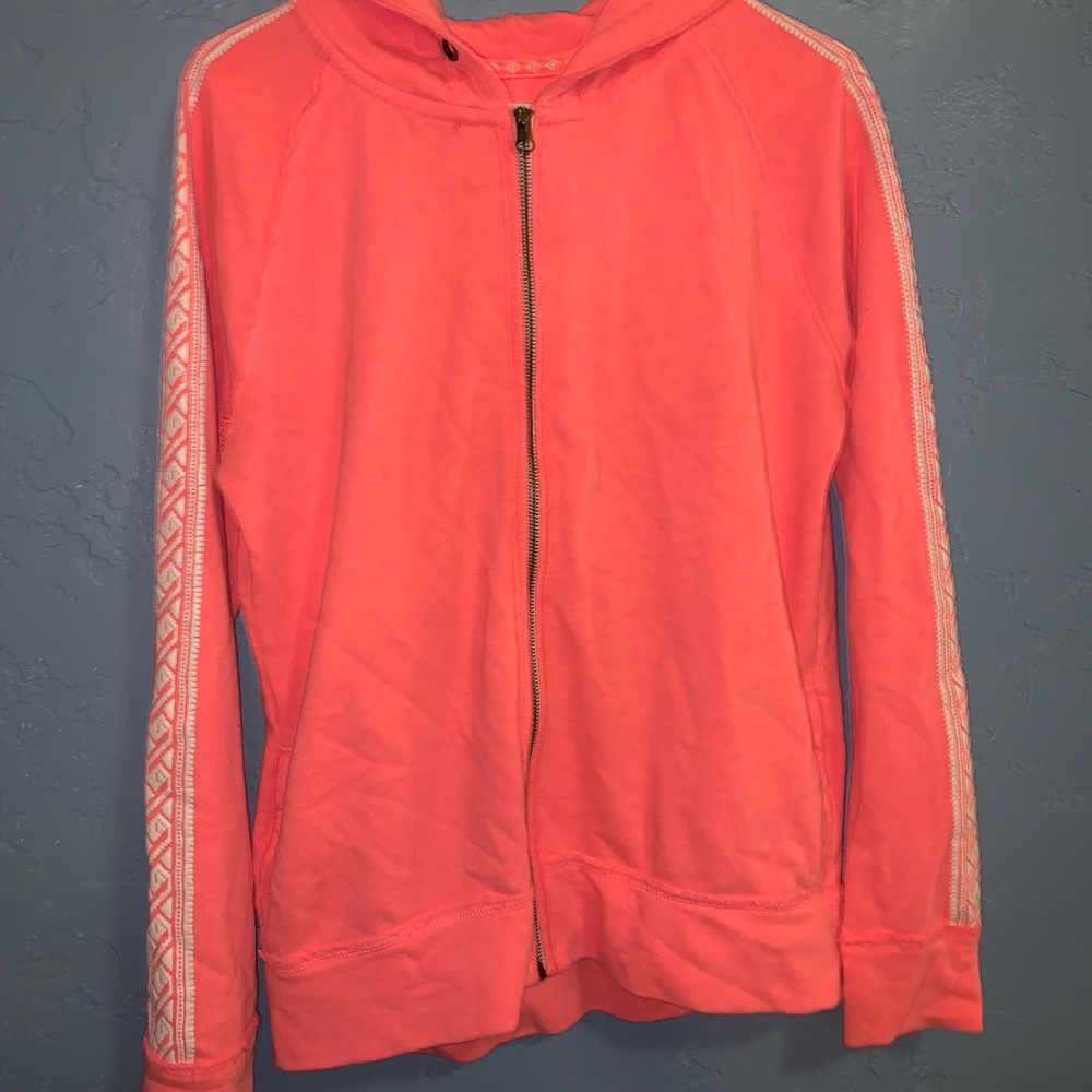 A pink long sleeve zip up